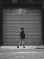 Walking Past the Shutter